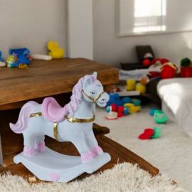 Graziose statuine rosa tema cavalluccio a dondolo